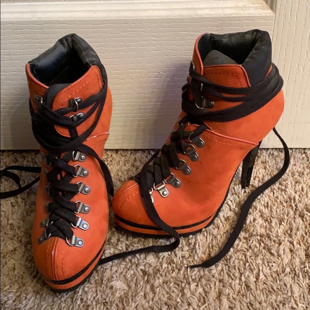Orange heeled boots. Size 8.